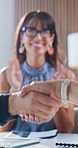 Creative, team and shaking hands with client in meeting, deal and applause for success in business. Happy people, handshake and clapping for achievement, congratulations and collaboration in office