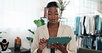 Fashion, woman and plan in retail store with tablet, stock control and online order on CMT website. Owner, black person and typing in boutique with tech, clothing merchandise or inventory management.