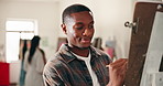 Man, artist and painting in class with canvas, drawing and art inspiration for gallery showcase. Smile, male person and painter in workshop with paint brush, artistic process and artwork masterpiece