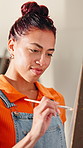 Happy woman, painting and artist in studio for project, reflection or illustration design in gallery. Creative person, smile and brush in process for talent showcase, inspect canvas and exhibition