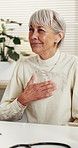Consultation, discussion and old woman in doctor office with chest pain, flu symptoms and guidance. Senior person, talk and heart problem in clinic appointment with virus, help and advice from GP.