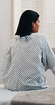 Sick, woman and thinking on hospital bed with vision, decision and acceptance of medical diagnosis. Back, female person and reflection in clinic with health condition, chronic illness or appointment.