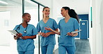 Medical team, nurses and talking in clinic with documents, laughing and case report evaluation. Happy women, healthcare and collaboration with paperwork for plan, funny joke and walking in hospital