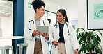Medical team, doctors and talking with tablet, walking or smile with feedback for case report advice. Happy women, healthcare or collaboration with tech for planning, test results or help in hospital