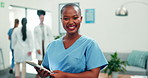Nurse, face or happy woman with tablet in clinic for medical assistance, insurance or health advice. Portrait, female person or healthcare worker with smile or technology for nursing help in hospital