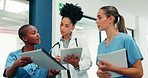 Medical team, women and planning with paperwork in hospital, schedule discussion or collaboration. People, doctor and nurses with healthcare document, problem solving or tablet for patient history