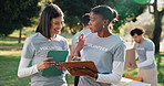 Volunteer, team or talking in park with clipboard, distribution schedule or smile for donation list. Women, tech and planning in nature for food drive, checklist and community service for charity