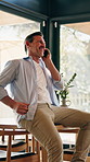 Digital, laugh and man in house with phone call, connection and happy moment in remote chat. Contact, talking or mature person with technology, discussion or joke reaction in online communication.