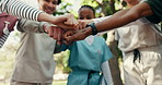 Hands, fist bump and medical students for education, learning and study at nursing school. Friends, outdoor and men and women in circle for development, college support and motivation for exam
