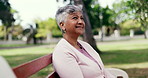 Mature, breathing or happy woman on park bench for outdoor peace, quiet or fresh air in nature. Relax, female person or thinking with calm wind or breeze for healthy ambition, mindfulness or wellness