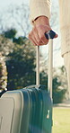 Walk, hands and suitcase for hotel arrival, weekend stay and destination for summer getaway. Guest, person or luggage outdoor for solo trip, lodge accommodation or enter location for vacation booking