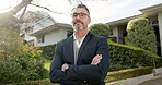 Face, man and real estate agent with confidence by house, residential property and investment. Arms crossed, mature person and realtor with home sale, mortgage opportunity and about us at front yard