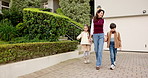 Mother, kids and leave house with backpack, holding hands and walking together to school in morning. Happy, mature woman and children outdoor by home with departure, safety and commute to academy.