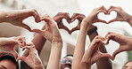 Hand gesture, group and friends with heart, outdoor and community with smile for solidarity or unity. Love, symbol and happy people with finger shape, social gathering and support with sign and care