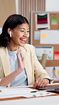 Laptop, woman and video call in office for logistics, fashion procurement and wave with earphones. Computer, happy entrepreneur and virtual chat with greeting, shipping tariff or fabric sourcing