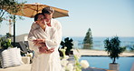 Couple, relax and smile at resort with hug, bonding and partner on anniversary and holiday. Embrace, vacation and happy mature people on getaway with love, commitment and honeymoon by hotel pool
