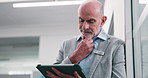 Mature, businessman or thinking with tablet in office for business decision, schedule or research. Man, employee or analyst with technology for company project, information or data study in workplace