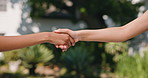 People, handshake and welcome with agreement for introduction or meeting in outdoor nature. Hello, b2b or shaking hands with greeting or partnership for success, confirmation or teamwork together