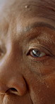 Patient, vision and old woman with eye exam for optometry assessment, optical wellness and thinking. Closeup, senior person and eyesight test in clinic for glaucoma, reflection and medical screening.