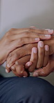 Holding hands, support and nurse witha patient in home for empathy, help and care with assurance. Caregiver, person and sympathy with consultation in healthcare, kindness and console for comfort