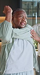 Home, stretching and senior woman with physiotherapist for muscle recovery, guidance or fitness. Black people, physiotherapy and help for mobility improvement, rehabilitation and smile in retirement