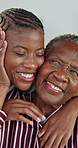 Hug, love and senior mother with woman in home, happy black family and connection together for care. Adult daughter, elderly parent and embrace with smile, kiss and support for relationship wellness