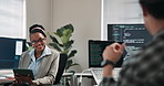 Man, programmer and discussion in office with computer, advice and problem solving for cybersecurity. Coworking, tech screen and coder team in agency for software development, brainstorming and back