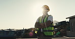 Thinking, construction and man with helmet on rooftop for inspection, property progress and project. Architecture, engineering and person with flare, thought and outdoor for infrastructure evaluation
