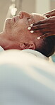 Calm, head and man in spa with massage, comfortable rest and soothing benefit in wellness center. Tranquil, masseuse and mature person with dreaming, peaceful treatment and tension release at retreat