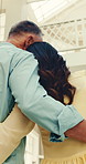 Love, holiday or couple in hotel with hug, tender connection or romantic moment on summer trip. Low angle, back or people with vacation together, partner bonding or relationship security at resort.
