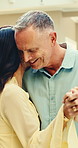 Dance, happy and mature couple at hotel for romantic getaway, anniversary and vacation together. Hospitality, flare and man with woman with music, love and embrace for holiday, bonding and resort