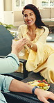 Couple, cheers and laugh with champagne in resort, anniversary and bonding with partner on vacation. Hotel, romance and happy people with alcohol on holiday, toast and celebration on special day