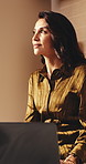 Freelancer, thinking and woman with laptop in hotel, info and research for story development on web. Travel, writer and happy mature person with technology, remote work and editing article in bedroom