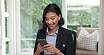 Freelancer, phone and woman in home office for reading  post, contact notification or account update. Mobile, remote work and happy person with text for investment news, chat app and online feedback