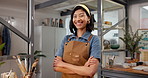 Pottery, face or woman in workshop with arms crossed, clay artist or pride in creative industry. Happy, ambition or artisan with confidence, craftsman career or about us as handmade ceramic designer.
