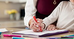 Hands, mom and child with homework for learning, writing skills and guidance for development. Family, home and mother with kid for assistance, teaching and support for language, education and lesson