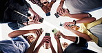 People, student and friends with phone in college for data sync, network connection or social media. Low angle, group or learners typing with technology for mobile discussion, chatting or texting app