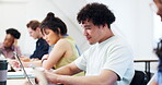 Thinking, students and man with laptop in university lecture hall, education and scholarship. Technology, person and study opportunity at college with idea, academic class or learning for future.