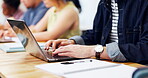 University, typing and hands in class with laptop, thesis research or assignment on education portal. Digital, man and student with tech, preparing assessment and college report in online submission.