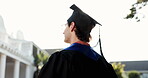 Education, man and thinking on campus for graduation, growth mindset or reflection of achievement. Back, flare and student graduate with future vision for transition, academic milestone or aspiration