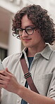 College student, online and happy man with phone, outdoor and communication with contact on website. Typing, message and person with mobile for exam update, smile and networking on university campus