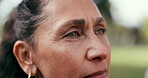 Thinking, park and senior woman on bench for reflection, inspiration and wondering outdoor. Retirement, memory and elderly person with thought, daydreaming and fresh air for wellness, calm and peace