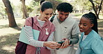 Laugh, university and students with phone for videos, funny meme and social media post outdoor. School, college and friends on cellphone for internet, humor and joke for bonding for medical education