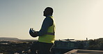 Break, construction and thinking with black man on building site for end of day as civil engineer. Complete, reflection and sky space with helmet removal of builder outdoor for architecture or design