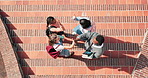 Above, people and high five at college for education, good news and success of academic results. Smile, students or gesture at university for celebration, assessment completion and learning milestone