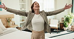 Spinning, happy and business woman in hotel room for excited, conference success and hospitality. Convention achievement, relax and seminar target with person on bed in lodge for smile and travel