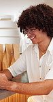 Man, laugh or typing in cafe with social media, funny online post or customer with text message meme. Happy, person and relax in coffee shop with internet, joke and humor for digital communication.