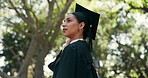 Thinking, woman and student in nature at graduation, ceremony and mindset for future career. Female person, graduate and vision outdoor with regalia, celebration and degree completion at university
