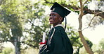 Thinking, black man and student with diploma at graduation, ceremony and mindset for future career. Smile, graduate and farewell in nature with certificate, celebration and complete degree at college