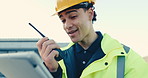 Builder, man and tablet with radio on construction site for architecture project or instructions. Male person, contractor or laborer talking with signal or technology for building safety or security
